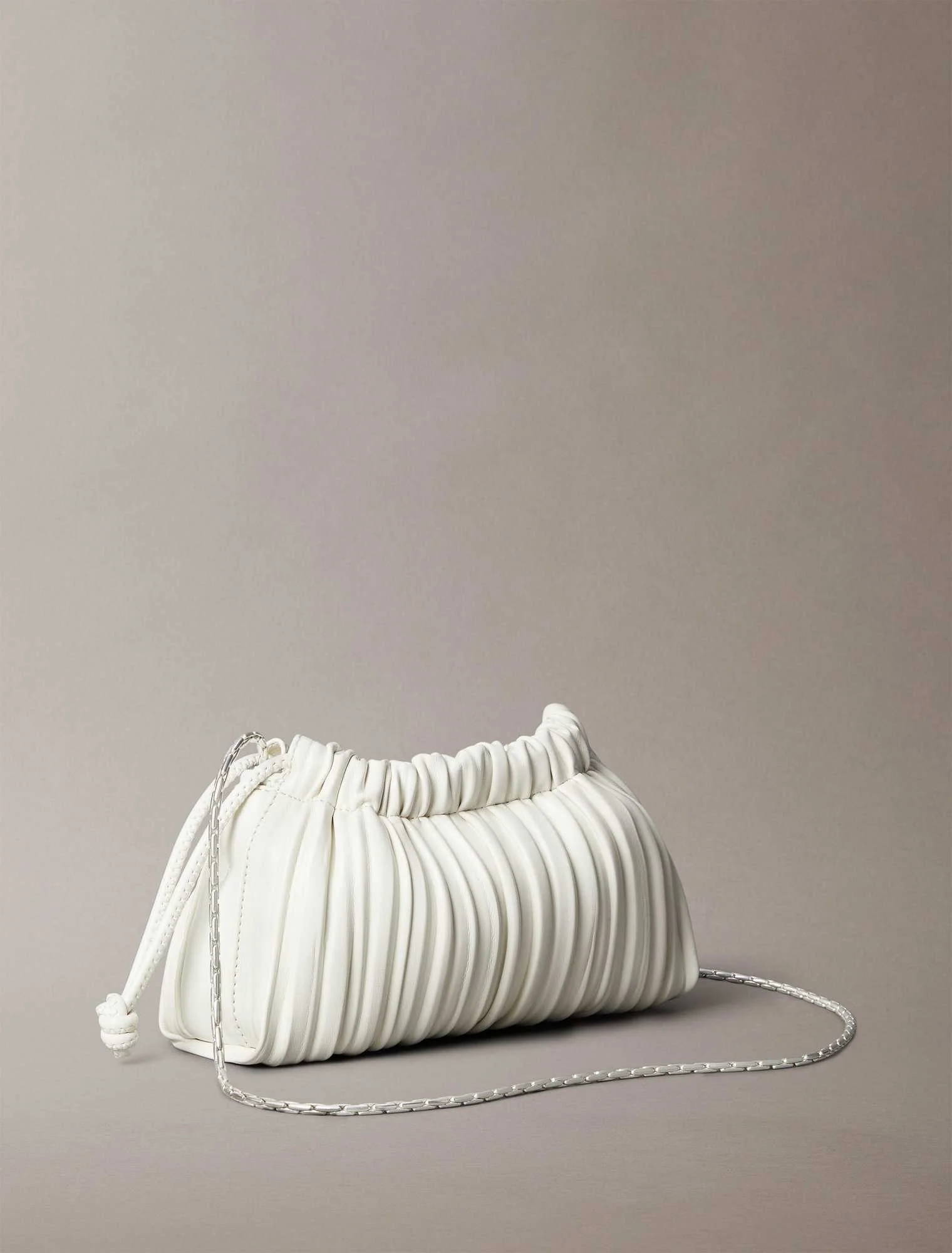 CALVIN KLEIN - PLISSE MINI DRAWSTRING... CALVIN KLEIN - PLISSE MINI DRAWSTRING...