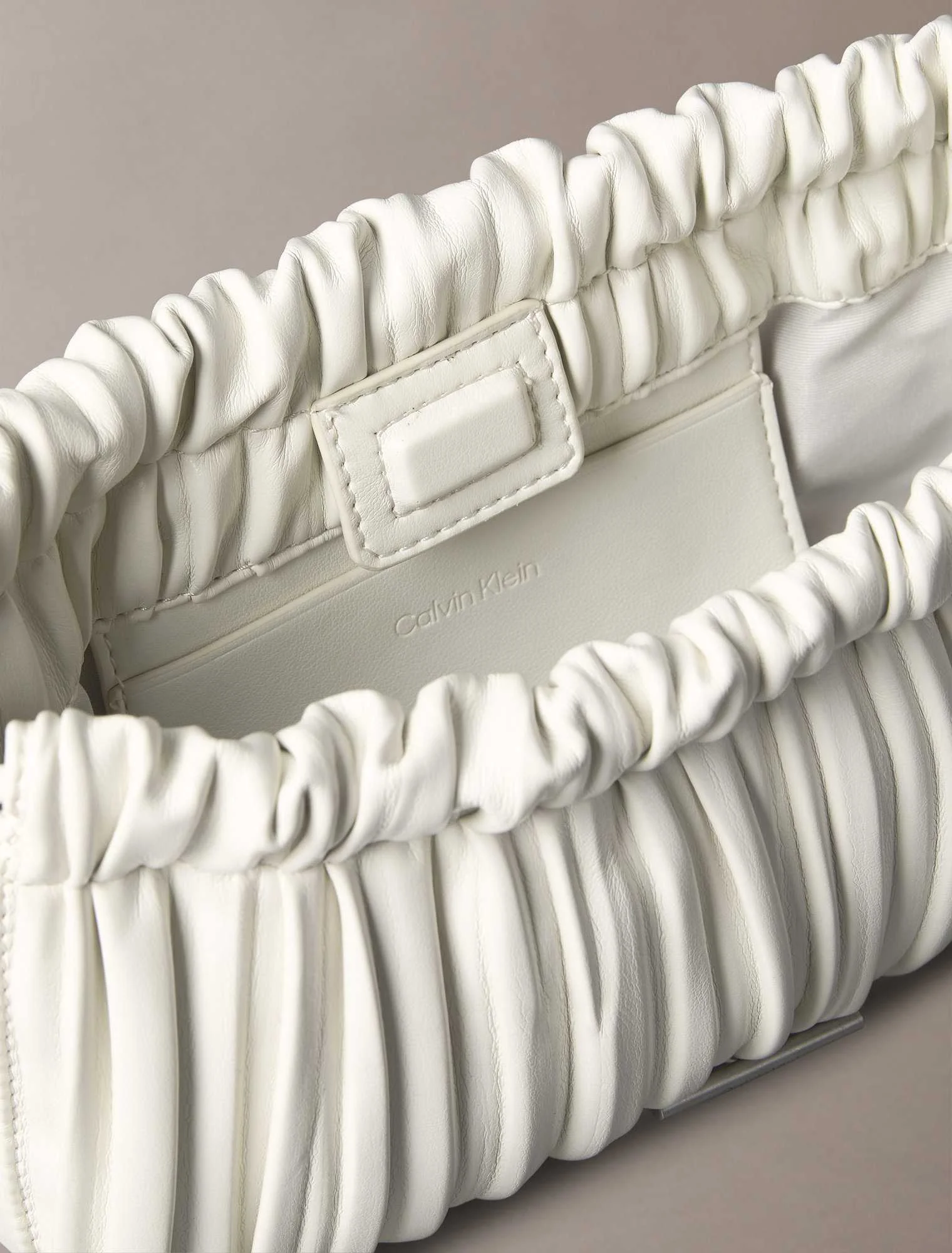 CALVIN KLEIN - PLISSE MINI DRAWSTRING... CALVIN KLEIN - PLISSE MINI DRAWSTRING...