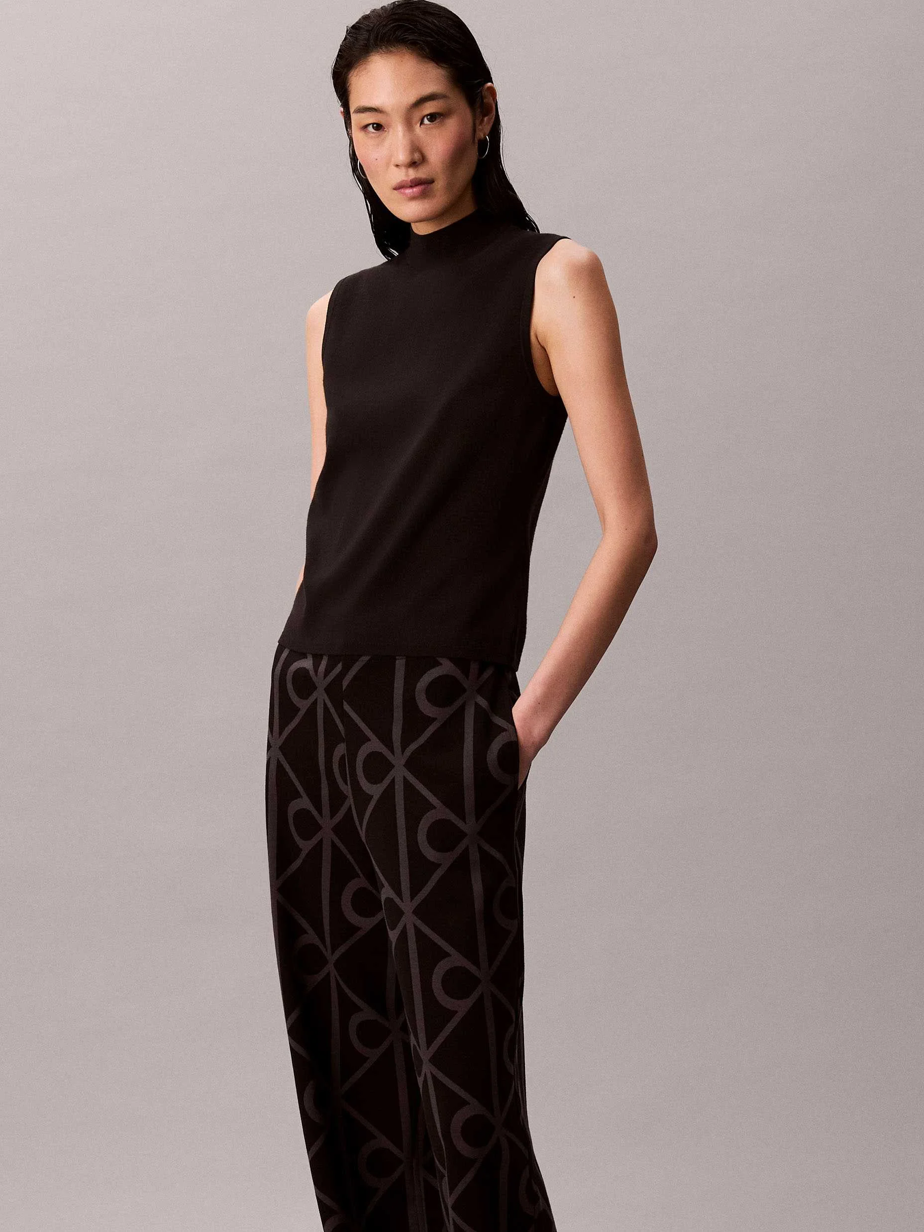 CALVIN KLEIN - EMBLEM AOP JACQUARD... CALVIN KLEIN - EMBLEM AOP JACQUARD...