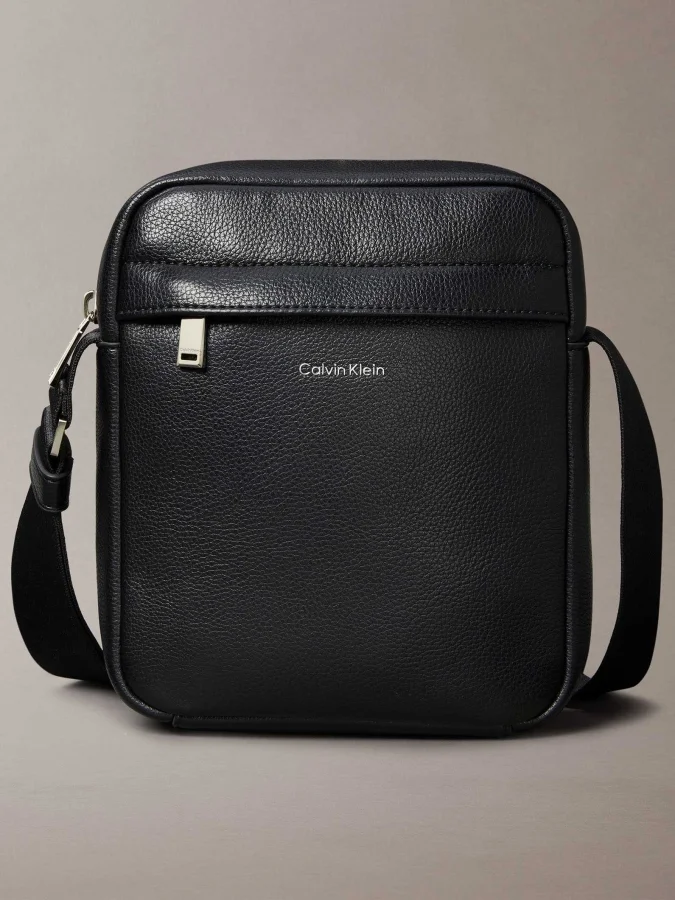 CALVIN KLEIN - RAISED REPORTER