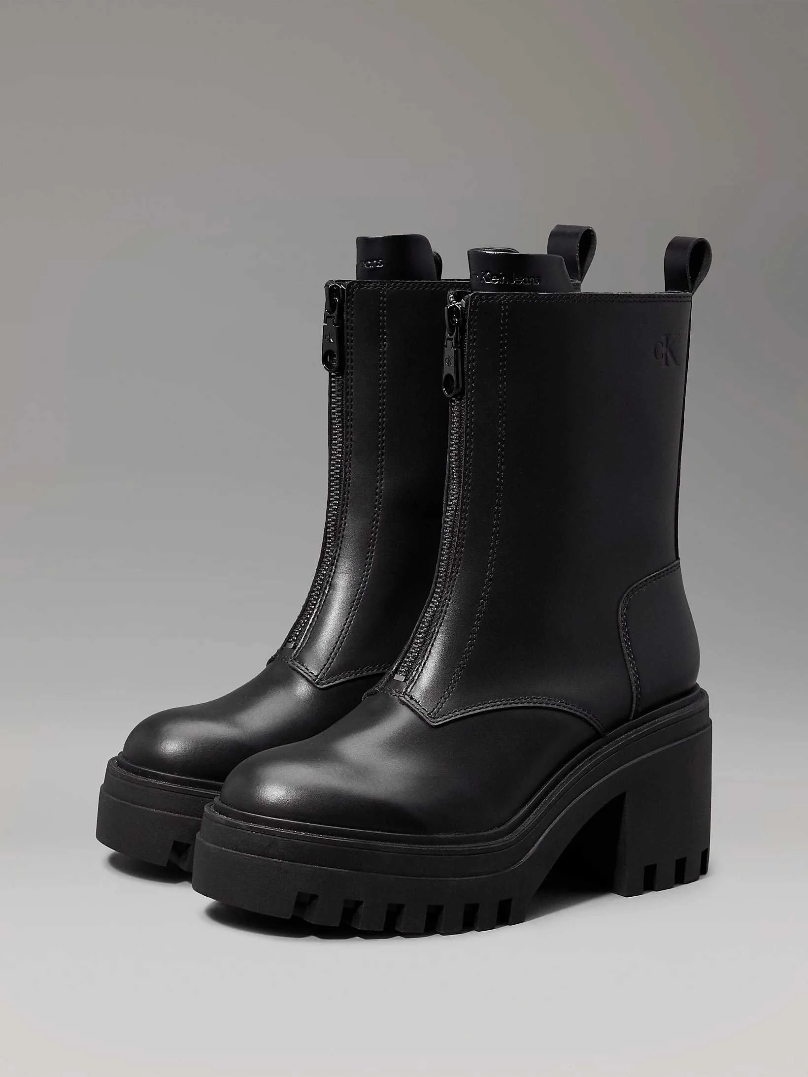 Calvin Klein - CHUNKY HEELED ZIP BOOT... Calvin Klein - CHUNKY HEELED ZIP BOOT...