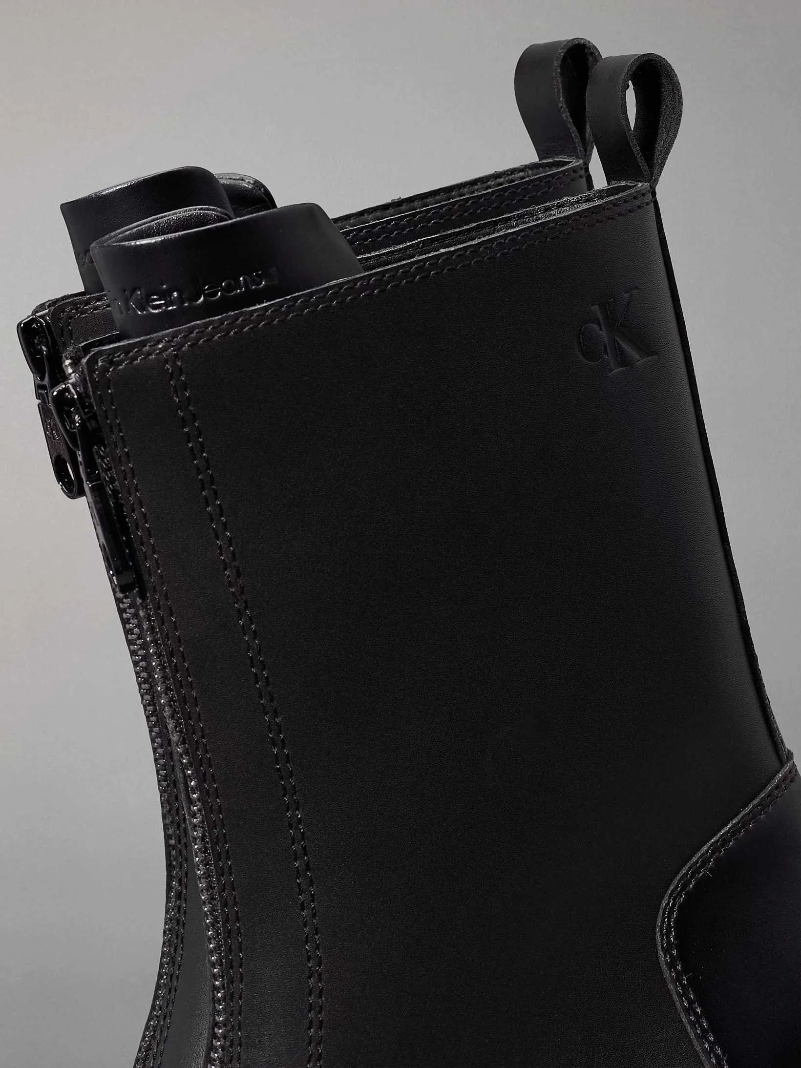 Calvin Klein - CHUNKY HEELED ZIP BOOT... Calvin Klein - CHUNKY HEELED ZIP BOOT...