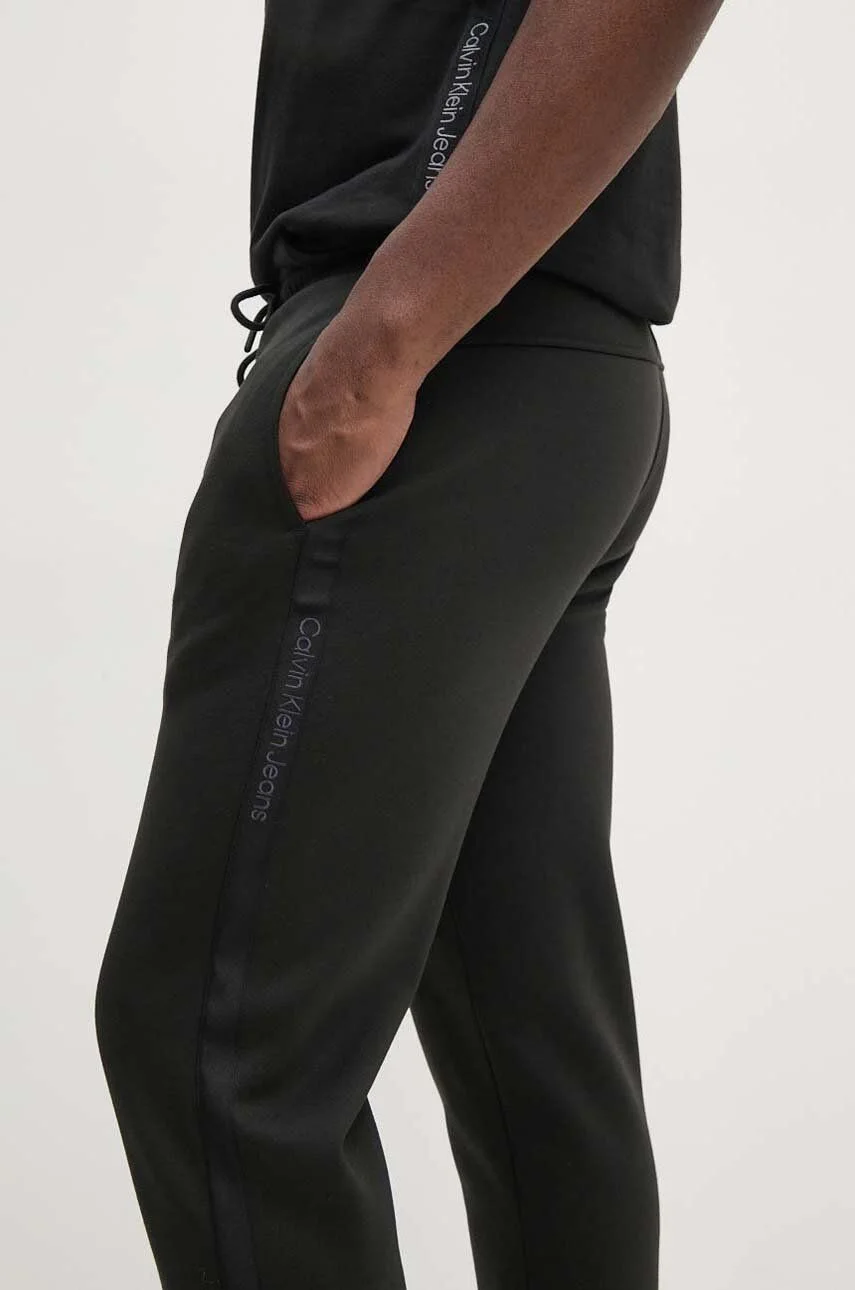 CALVIN KLEIN JEANS - LOGO TAPE HWK PANT CALVIN KLEIN JEANS - LOGO TAPE HWK PANT